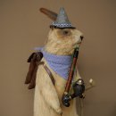Taxidermied Wolpertinger marmot hiker with hat, backpack,...